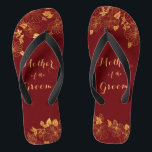 Mother of the Groom Dark Burgundy & Gold Foliage Thongs<br><div class="desc">The Mother of the Groom Dark Burgundy & Gold Foliage foliage flip flops have a dark burgundy background that is adorned with an intricate gold floral greenery pattern and customisable modern typography. The combination of the rich burgundy and the shimmering gold create an elegant and luxurious aesthetic. It's a beautiful...</div>