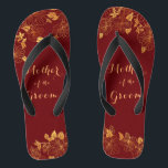 Mother of the Groom Dark Burgundy & Gold Foliage Thongs<br><div class="desc">The Mother of the Groom Dark Burgundy & Gold Foliage foliage flip flops have a dark burgundy background that is adorned with an intricate gold floral greenery pattern and customisable modern typography. The combination of the rich burgundy and the shimmering gold create an elegant and luxurious aesthetic. It's a beautiful...</div>