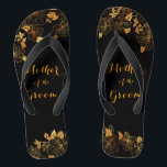 Mother of the Groom Luxury Black & Gold Foliage Thongs<br><div class="desc">These gorgeous Mother of the groom black and gold foliage flip flops boasts a luxurious black and gold palette, with a stunning golden floral pattern and modern typography set against a black background, exuding elegance and sophistication. It's a beautiful gift for your bridal party. View the collection on this page...</div>