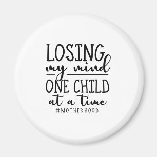Motherhood One Child At A Time Magnet