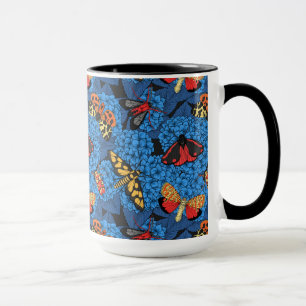 Moths on blue hydrangea mug