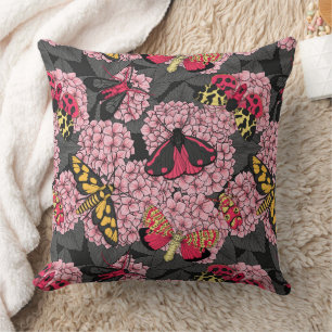 Moths on pink hydrangea cushion