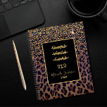 Motivational leopard pattern brown black 2025 planner<br><div class="desc">Elegant,  cool,  glamourous and feminine with brown,  golden and black leopard pattern,  decorated with golden confetti. Personalise and add your name.  Template for a year,  yellow letters. A black frame with the motivational quote: Should,  Would,  Could DID.
Perfect for female Entrepreneurs,  make-up artists,  store owners,  consultants.</div>