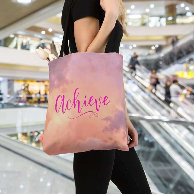 Motivational Quotes Pink Sky Hot Pink Script Font Tote Bag (Woman carrying a pink and purple sky, inspirational quote tote bag, in a shopping mall.)
