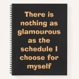 Motivational typography in beige text on notebook