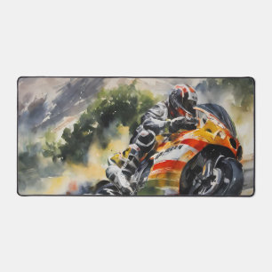 Motorbike cornering up a mountainside desk mat
