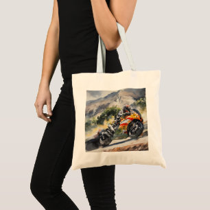 Motorbike cornering up a mountainside tote bag
