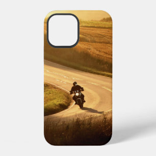Motorcycle on countryside road at autumn evening. iPhone 12 case