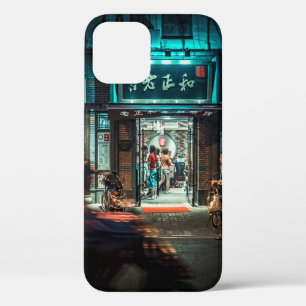 MOTORCYCLES AND PEOPLE PASSING BY AT NIGHT TIME iPhone 12 CASE