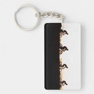 Mountain Bike Riders Make Their Way Over The Dam Key Ring