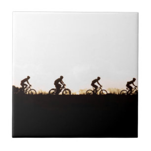 Mountain Bike Riders Make Their Way Over The Dam Tile