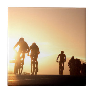 Mountain Bike Riders Make Their Way Over The Top Ceramic Tile