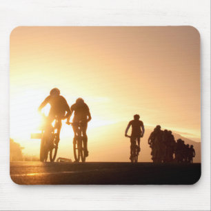 Mountain Bike Riders Make Their Way Over The Top Mouse Pad