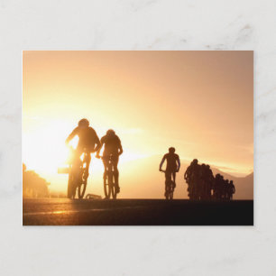 Mountain Bike Riders Make Their Way Over The Top Postcard