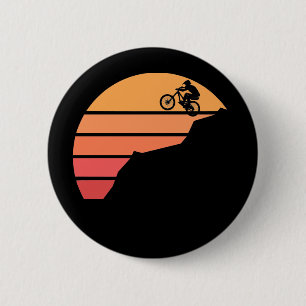 Mountain biking in the susnset 6 cm round badge
