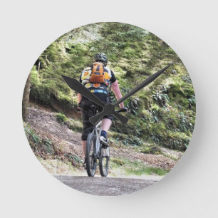MOUNTAIN BIKING ROUND CLOCK