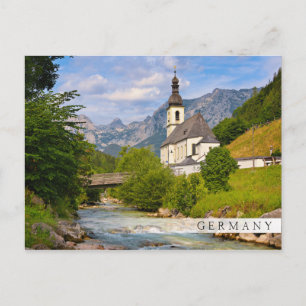 Mountain church with stream landscape postcard