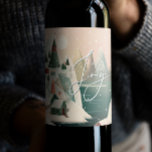 Mountain Landscape | Joy Christmas Holiday Party Wine Label<br><div class="desc">Add a festive finishing touch to your holiday wine bottles with this elegant Christmas wine label featuring a hand painted winter mountain village and graceful “Joy” script. Snow covered cabins, alpine peaks, and soft snowfall set a peaceful tone - perfect for seasonal celebrations, cosy dinners, or holiday gifting. This scenic...</div>