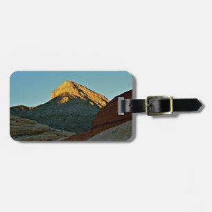 MOUNTAIN PEAK LIT AT SUNSET IN HIGH DESERT LUGGAGE TAG