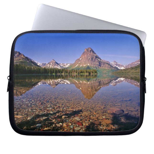 Mountains reflect into calm Two Medicine Lake in Laptop Sleeve (Front)