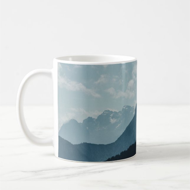 MOUNTAINS UNDER WHITE SKY COFFEE MUG (Left)