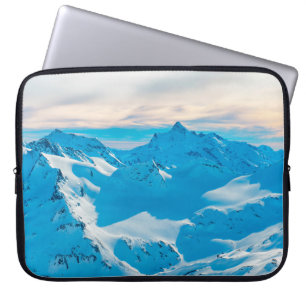 Mountains with snow peaks and sunset skysnow,alpin laptop sleeve