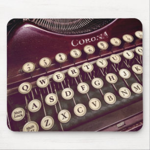 Mouse roams over a classic typewriter pad