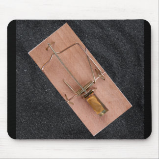 Mouse trap with peanut butter bait mouse pad