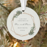 Mr and Mrs Geometric Photo Our First Christmas Ornament<br><div class="desc">Did you get married this year? Add a memory to your tree with this modern acrylic ornament with a gold geometric frame surrounded by greenery and white flowers. Inside the frame are the words, "Our First Christmas as Mr. and Mrs." along with your last name and year. The backside has...</div>