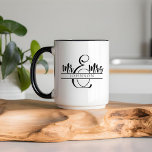 Mr. and Mrs. Newlywed Couple Gifts Two-Tone Coffee Mug<br><div class="desc">Celebrate the newlyweds with this charming Mr. and Mrs. Newlywed Couple Gifts Two-Tone Coffee Mug! Perfect for cosy mornings together,  this stylish mug features a sleek two-tone design that adds a pop of colour to their daily routine.</div>