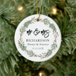 Mr & Mrs Christmas Wreath Wedding Ceramic Ornament<br><div class="desc">Mr & Mrs Christmas Wreath Wedding Ceramic Ornament. Our customisable template allows you to create a one-of-a-kind ornament that captures the love and joy of this memorable milestone. Add your names, wedding date, or even a special message to make it truly unique. It's the perfect keepsake to cherish for years...</div>