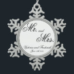 Mr. & Mrs. Newlywed Snowflake Pewter Christmas Ornament<br><div class="desc">Did you get married this year? Add a memory to your tree with this wedding keepsake ornament with the words, "Mr. and Mrs." along with your names and wedding date in a beautiful black calligraphy on white. This elegant ornament also makes a gift for a newlywed couple for their first...</div>