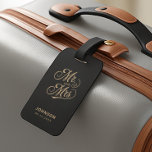 Mr. & Mrs. Newlyweds Gold Script Black Wedding Luggage Tag<br><div class="desc">This editable black wedding luggage tag template offers an elegant, vintage inspired look, perfect for couples who value a classic and personalised touch for their travels. The front side features “Mr. & Mrs.” in timeless gold coloured calligraphy with the last name and wedding or special date, creating a beautiful keepsake....</div>