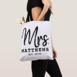 Mrs Black Modern Script Custom Wedding Newlywed    Tote Bag<br><div class="desc">Modern and casual chic black calligraphy script "Mrs." women's wedding tote bag features custom text that can be personalised with the bride's new married last name and wedding date. Perfect accessory for the honeymoon and beyond!</div>