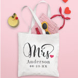 Mrs. Black Script Married Monogram Wedding Tote Bag<br><div class="desc">Personalised tote bags for the newly married Mr. and Mrs. feature elegant black script and custom last name and wedding date monogram text that can be personalised. Design includes a cute red heart detail. Makes a great wedding gift! Shop our store for the coordinating Mr. bag design.</div>