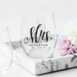 Mrs. script personalised newlywed bride stemless wine glass<br><div class="desc">A perfect gift for the bride-to-be or a keepsake honeymoon item. This wine glass features a modern calligraphy Mrs. in black with a spot for her new last name and an established date. Great bridal shower or bachelorette gift! Find more matching items in the collection by Lea Delaveris Design.</div>