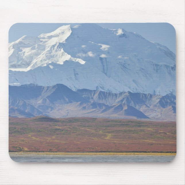 Mt. McKinley towers behind a camper and his tent Mouse Pad (Front)