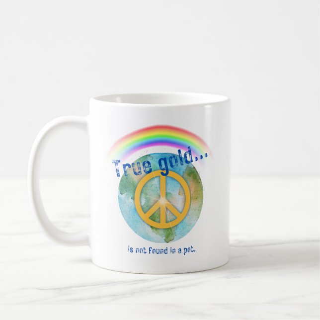 Mug with a graphic of earth with a peace sign. (Left)