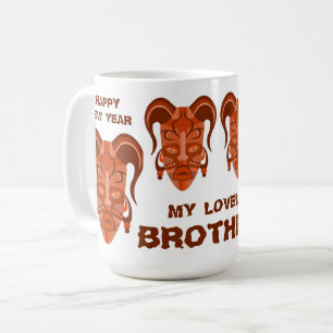 MUG WITH TARDITIONAL MASK ART
