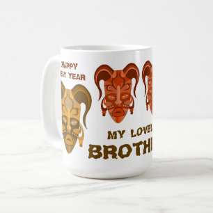 MUG WITH TARDITIONAL MASK ART