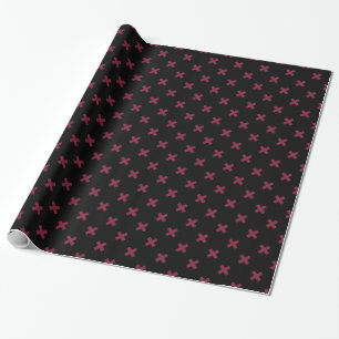 Mulberry cross stitches on black wrapping paper