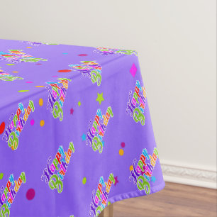 Multi Colour Happy Birthday Graphic on Purple Tablecloth