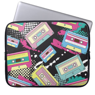 Multi Coloured cassettes on a black background sea Laptop Sleeve