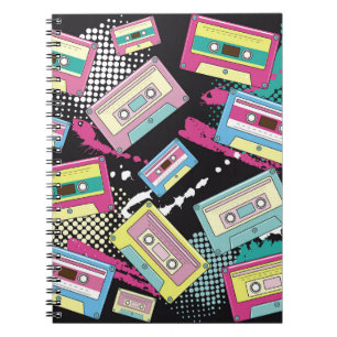 Multi Coloured cassettes on a black background sea Notebook