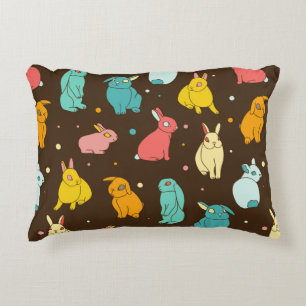 Multi-coloured, different rabbits, hares on a dark decorative cushion