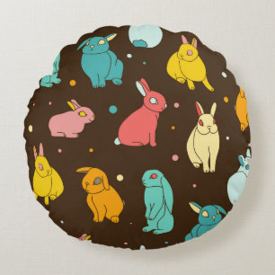 Multi-coloured, different rabbits, hares on a dark round cushion