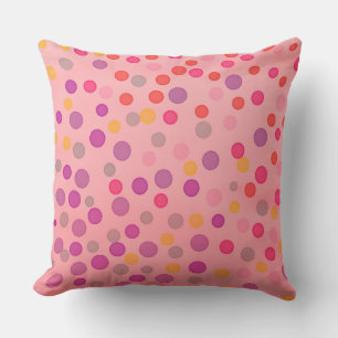 Multicolor pastel dots on pink cushion