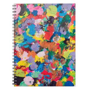 multicolor stained background made with paintbrush notebook