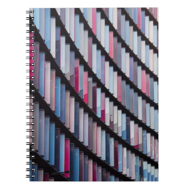 Multicolored books on rack (Front)