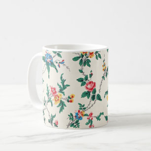 Multicolored flower pattern on white coffee mug